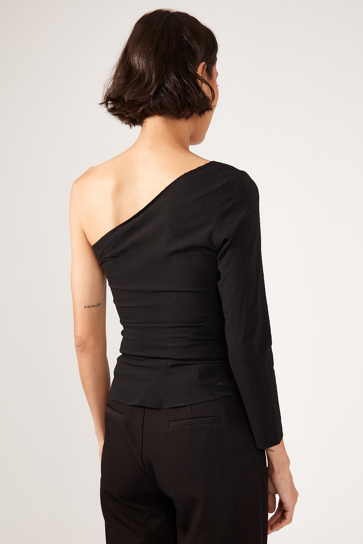 Black Tucked Asymmetrical Top