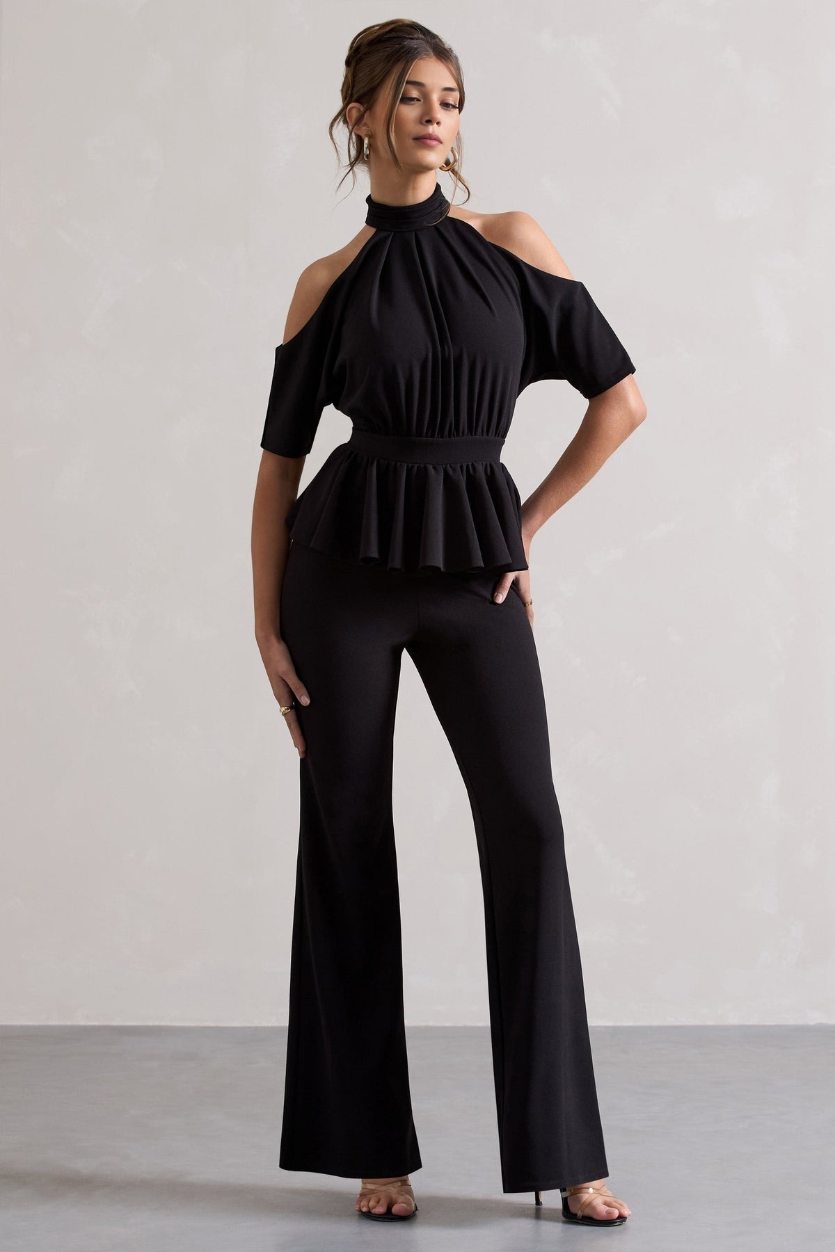 Black High-Neck Jumpsuit with Cut-Out and Peplum Waist